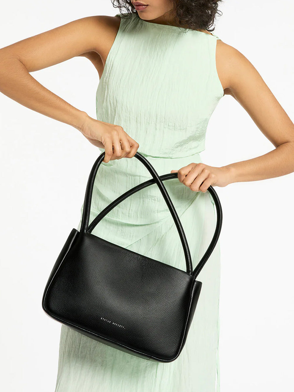 STATUS ANXIETY LIGHT OF DAY BAG